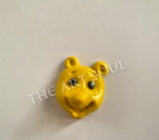 Pooh bear face miniature fridge magnet